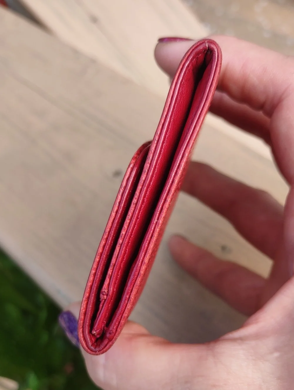CHANEL Red Quilted CC Embossed Leather Coin Wallet.